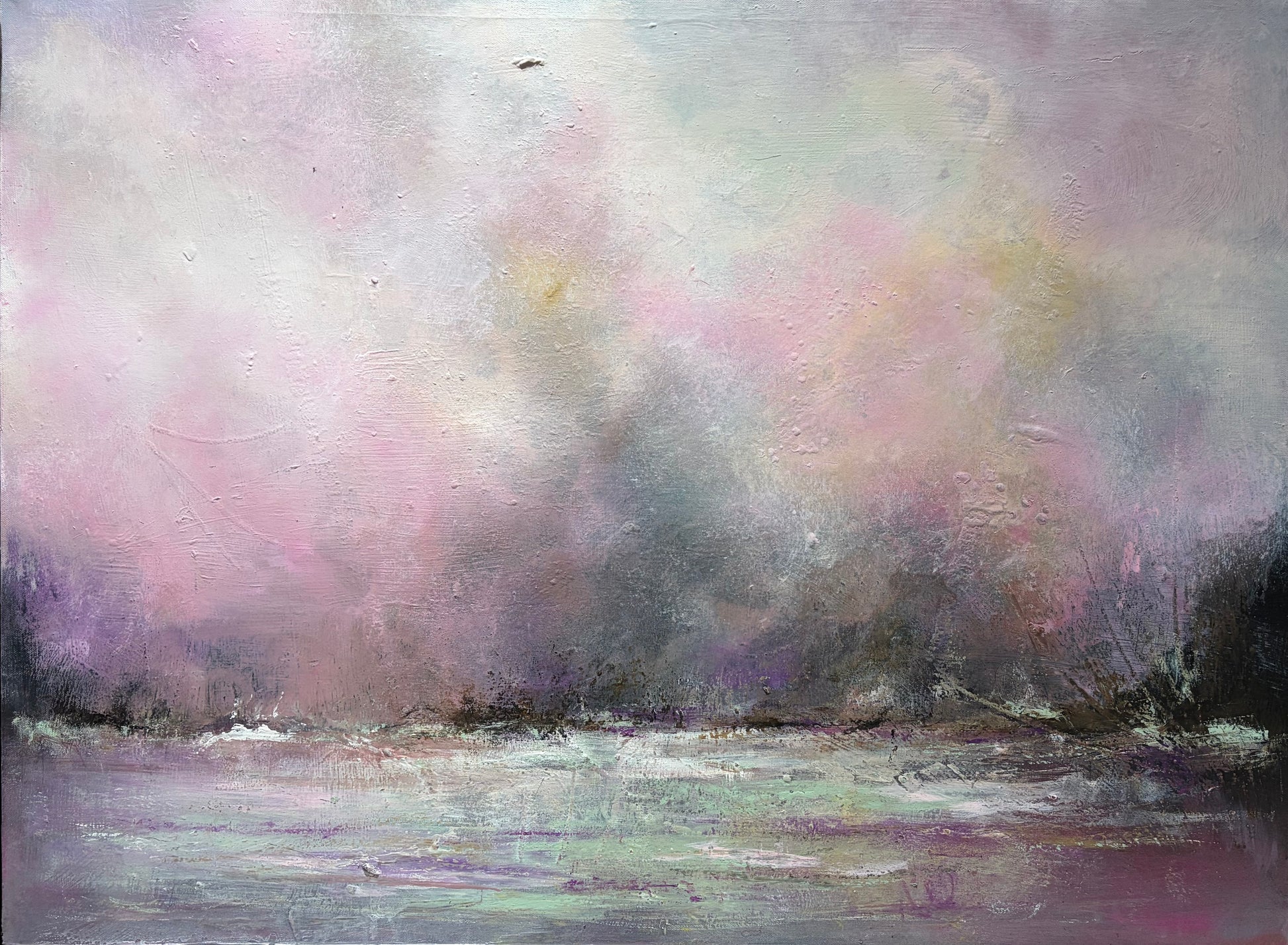 An impressionistic landscape painting featuring a misty sky in pastel shades of pink, purple, gray, and white, with a dark tree line along the horizon and a reflective body of water below.