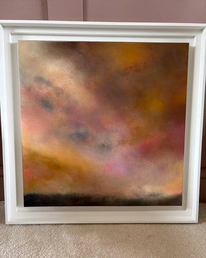 Framed abstract painting with multicolored brush strokes on a neutral background